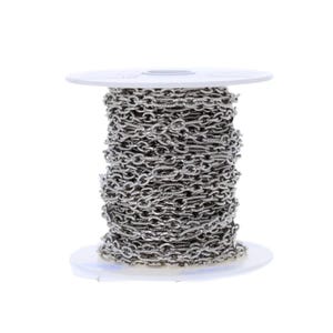 May include: A spool of silver-colored chain. The chain is made of small, oval links and is tightly wound around a white plastic spool. The chain appears to be made of metal and has a shiny finish. The background is plain white.