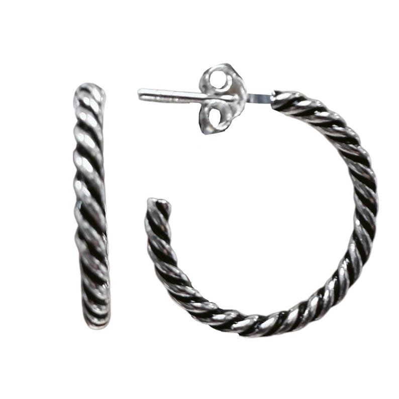 May include: A pair of silver hoop earrings featuring a twisted rope texture. The earrings have a polished finish with darkened recessed areas to highlight the spiral pattern. Each hoop includes a post and a butterfly clutch backing for secure wear.