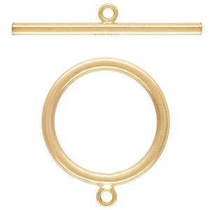 May include: Gold-toned metal toggle clasp with a round ring and a straight bar. The clasp is used for necklaces, bracelets, and other jewelry.