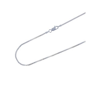 May include: A silver-toned box chain necklace featuring a series of interconnected square links that create a smooth, uniform appearance. The chain is secured with a lobster claw clasp mechanism, providing a functional closure for the jewelry piece.