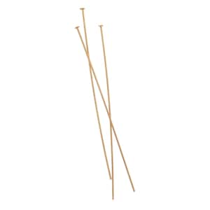 May include: Three gold-colored head pins, each with a rounded head, are arranged in a vertical stack.