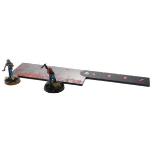May include: A black and white game board with red blood splatter and numbers. Two miniature figures are standing on the board. One figure is holding a knife.