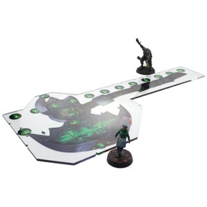 May include: A clear acrylic game board with a green and black axe design. The board has green circles around the edge. Two miniature figures are on the board, one is green and the other is wearing a green and white outfit.