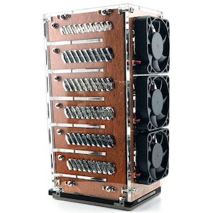 May include: A clear acrylic case with a wooden interior and multiple black fans. The case has a series of slots on the front, each with a silver metal plate.