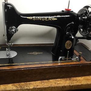 1947 Singer 201k Handcrank one owner all original, reconditioned and equiped.