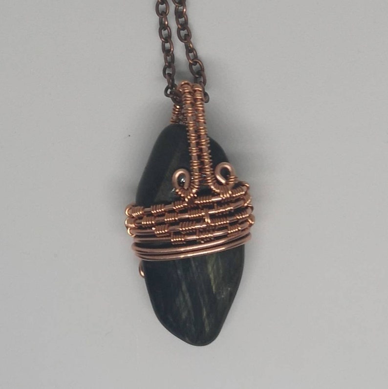 includes free copper necklace Blue Tigers Eye Pendant