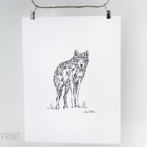 May include: A black and white print of a wolf, rendered in a geometric style. The artwork is on a white paper, and the print is labeled "5x7 PRINT". The print is hanging from a clothesline.
