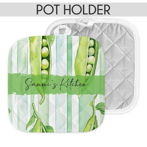 May include: Square pot holder with a green pea pod design and the text "Sammi's Kitchen" on a green banner. The pot holder has a white quilted backing and a loop for hanging. The top of the image reads "POT HOLDER".