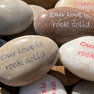 Our love is rock solid - Engraved River Rock - Inspirational Word Stone - Sold Individually