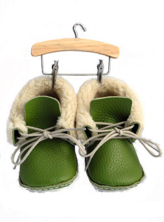 green baby shoes