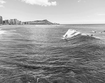 Black and White Surf Photo - Female Surfer Riding a Wave in Waikiki Beach, Hawaii.