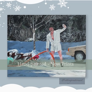 May include: A rectangular art print featuring a painted scene of a person in a white bathrobe standing in snow, holding a drink and a red hose near a car. The text Hand-painted - Now Prints is centered across the image, with @sittingovationart below.