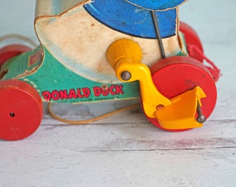 Vintage Fisher Price Talking Donald Duck Wood Pull Toy, 765, Makes Quacking Noise As Rolls, Walt Disney Productions, Collectible, Disneyana Vintage Fisher Price Talking Donald Duck Wood Pull Toy, 765, Makes Quacking Noise As Rolls, Walt Disney Productions, Collectible, Disneyana