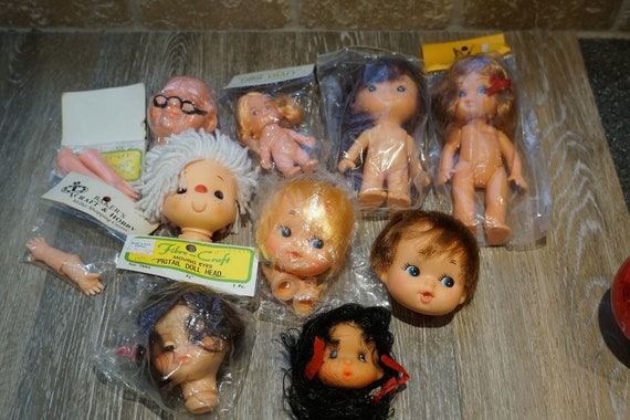 rubber doll heads