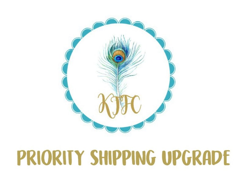 May include: A teal blue circle with a white background and a gold peacock feather with a blue eye. The text "KJF" is in gold lettering inside the circle. The text "PRIORITY SHIPPING UPGRADE" is in gold lettering below the circle.