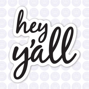 May include: A white sticker with the words "hey y'all" in black cursive script. The sticker has a white border and is set against a background of repeating circular logos.