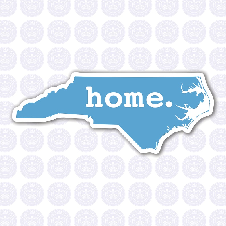 May include: A light blue sticker in the shape of North Carolina with the word "home." in white. The sticker has a white border and is set against a background of repeating circular logos.