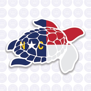 May include: A turtle-shaped sticker featuring the North Carolina state flag design. The sticker has a white border and is set against a background of repeating circular logos. The flag design includes blue, red, white, and yellow colors.