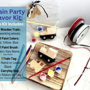 May include: A train party favor kit with a wooden train, paint, and a paint brush. The kit includes red, yellow, and blue paint, a train tag, and a carrying bag. The text on the image says "Train Party Favor Kit".