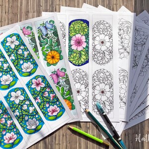 Pode incluir: Uma cole&ccedil;&atilde;o de marcadores para colorir com temas florais e borboletas. Alguns s&atilde;o coloridos com tons vibrantes, enquanto outros s&atilde;o desenhos a tra&ccedil;o em preto e branco. L&aacute;pis de cor est&atilde;o espalhados. O texto "Hattifant" &eacute; vis&iacute;vel.