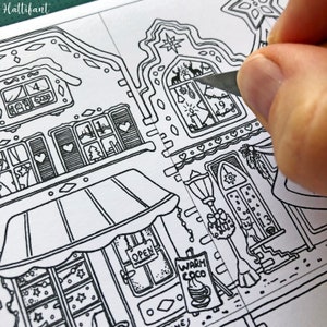 May include: A black and white illustration of a gingerbread house with a shop front that says "Open" and a sign that says "Warm Coco". The house is decorated with hearts, stars, and a Christmas tree.