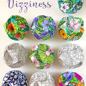 Pode incluir: Uma vista a&eacute;rea mostra nove trabalhos manuais em papel com padr&otilde;es florais coloridos. Os trabalhos manuais apresentam v&aacute;rios desenhos, incluindo borboletas, girass&oacute;is e intrincados padr&otilde;es florais em preto e branco. O texto "Flower Dizziness" est&aacute; escrito em it&aacute;lico.