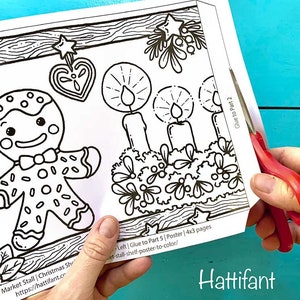 May include: A black and white printable Christmas market stall coloring page featuring a gingerbread person, candles, and a poinsettia. The page is part of a larger poster project and includes instructions to glue to part 2.