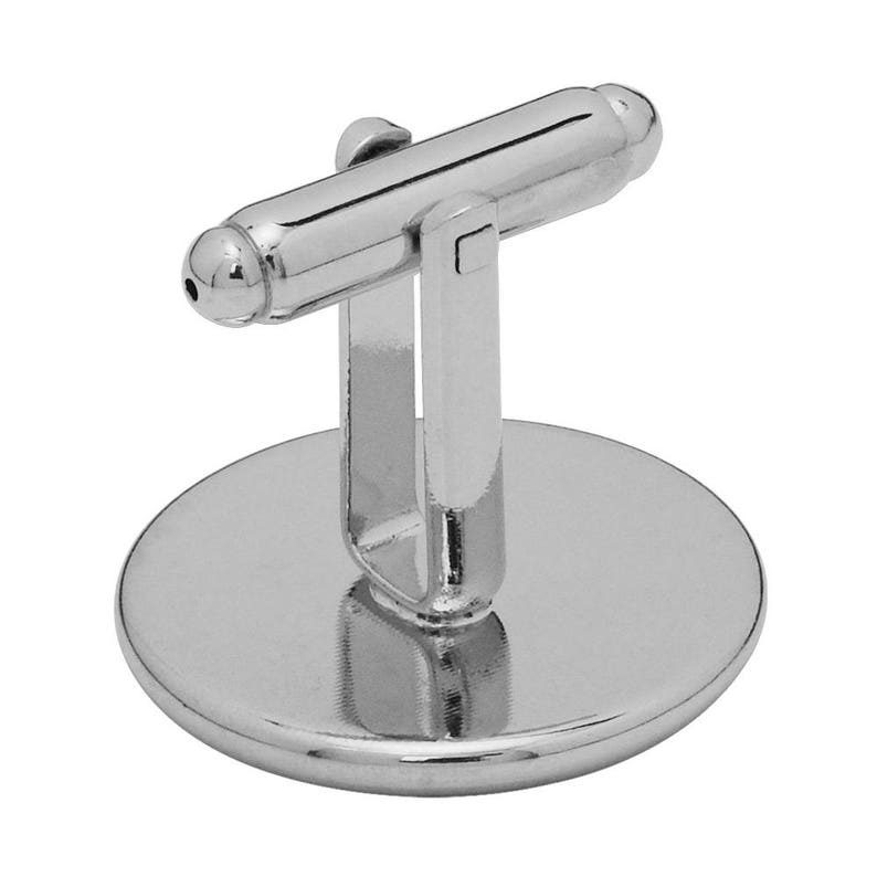 May include: Silver cufflinks with a round, smooth, silver base.