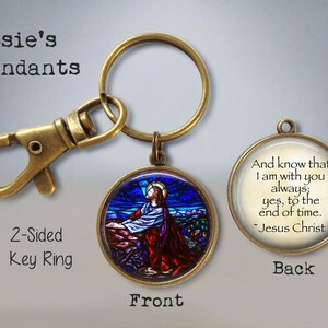May include: A two-sided key ring with a stained glass image of Jesus Christ on the front and a quote from Jesus Christ on the back. The quote reads: "And know that I am with you always; yes, to the end of time. ~Jesus Christ"