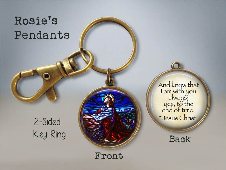 May include: A two-sided key ring with a stained glass image of Jesus Christ on the front and a quote from Jesus Christ on the back. The quote reads: "And know that I am with you always; yes, to the end of time. ~Jesus Christ"