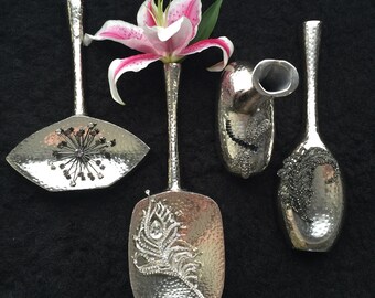 Choice of 10" Hammered Chrome Vases with Swarovski Crystal Feather, Dragonfly, or Starburst Embellishments.