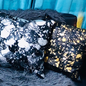 Black Leather Patchwork Pillows with Choice of Silver or Gold Gilded Designs.