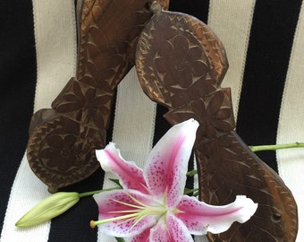 Antique Asian Wooden Platform Shoes with Intricate Hand-Carved Floral Motif.