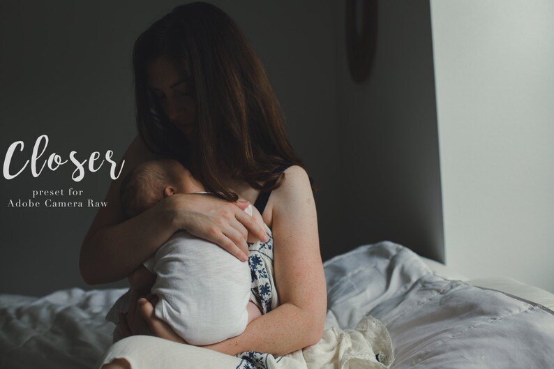 May include: A woman holds a baby in her arms. The woman is wearing a white dress with a floral pattern. The baby is wearing a white onesie. The image is titled "Closer preset for Adobe Camera Raw".