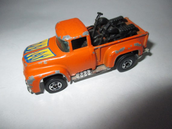 hot wheels 1973 blue truck with motorcycles