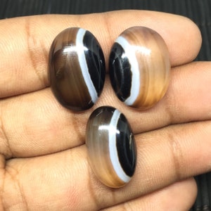 Atacado, Cabochão de ônix preto natural (22x13x6 mm a 22x15x6 oval, cabochão de ônix de alta qualidade com 55,80 ct a granel