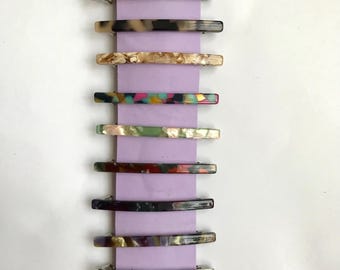 Un paio di fermagli/fermagli sottili in acetato adatti ai capelli fini in 10 colori