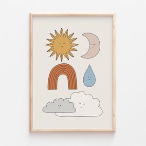 May include: A framed print featuring a whimsical illustration of a sun, moon, rainbow, raindrop, and two clouds. Each element has a smiling face.