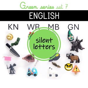 May include: A collection of small, colorful charms and objects, including a knife, a gnome, and a sheep, arranged on a white surface. The text "Green series set 7" and "ENGLISH" are at the top, with "silent letters" in a green circle.