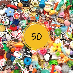 Mix of 50 I spy trinkets objects miniatures. best selling