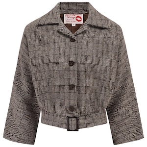 May include: Brown and tan checkered jacket with a notched collar, button closure, and a belt. The jacket has three-quarter sleeves and a vintage aesthetic. The label on the jacket reads "RocknRomance Vintage".
