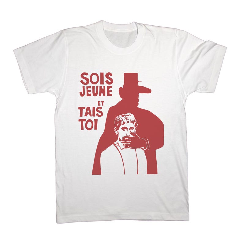 May include: White t-shirt with a red graphic. The graphic features a silhouette of a person covering another person's mouth, with the French text "SOIS JEUNE ET TAIS TOI" above.