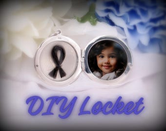 May include: Open silver locket with a black ribbon on one side and a photo of a child on the other. The locket is displayed against a backdrop of white and blue flowers. The words "DIY Locket" are written in blue script.