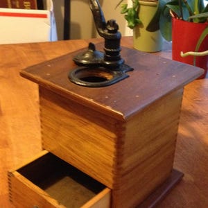 A Larger Vintage Wood Coffee Grinder with Cast Iron Crank