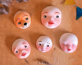 Assortment of faces for doll making - various doll heads