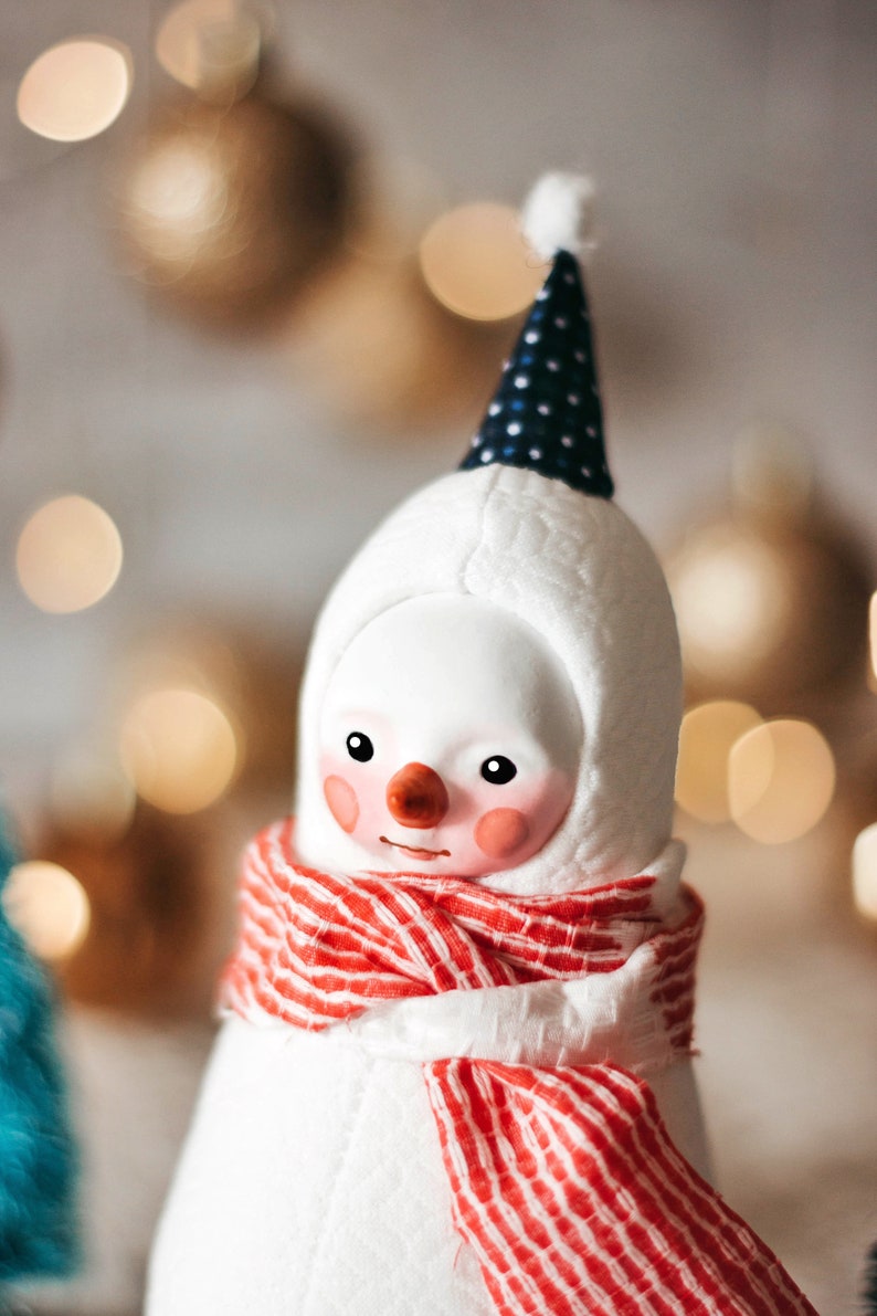 Plush snowman figurine with a red scarf whimsical winter decoration image 3