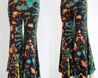 May include: Black, orange, green, and blue tie-dye flared pants with a gathered waistband and a long, flowing design.