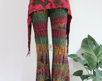 May include: Tie-dye bell bottom pants with a matching tie-dye skirt overlay. The pants and skirt are a mix of red, green, orange, and purple.