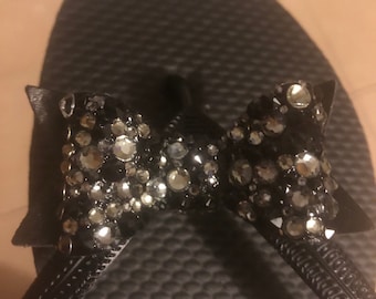 Black flip flops embellished