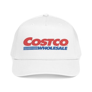 May include: White baseball cap with the Costco Wholesale logo embroidered in red and blue. The cap has a curved brim and a structured crown. The text is clear and easy to read.
